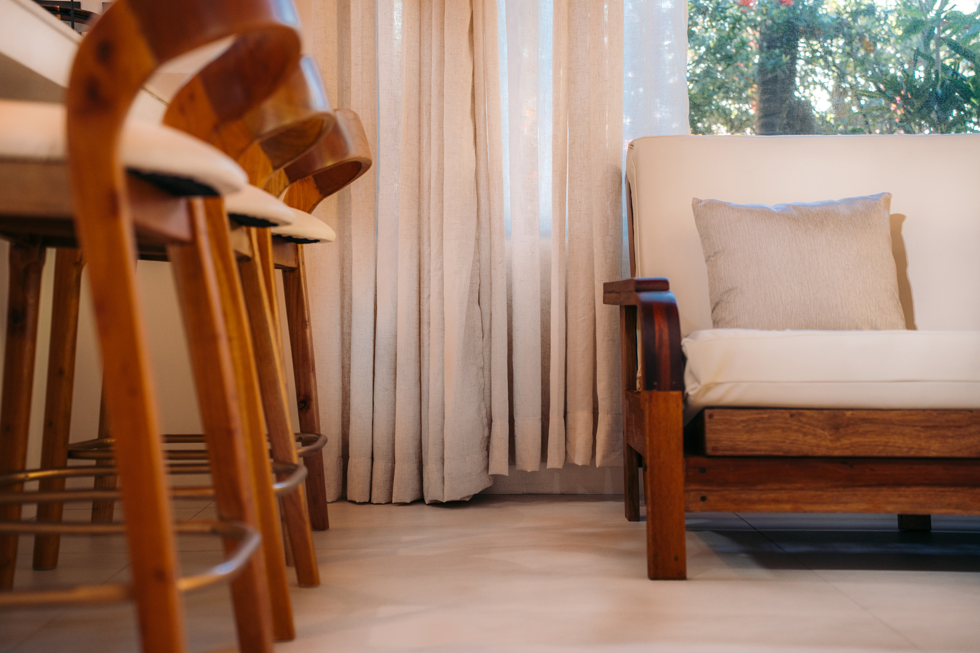 Serena villa stools with curtain and sofa